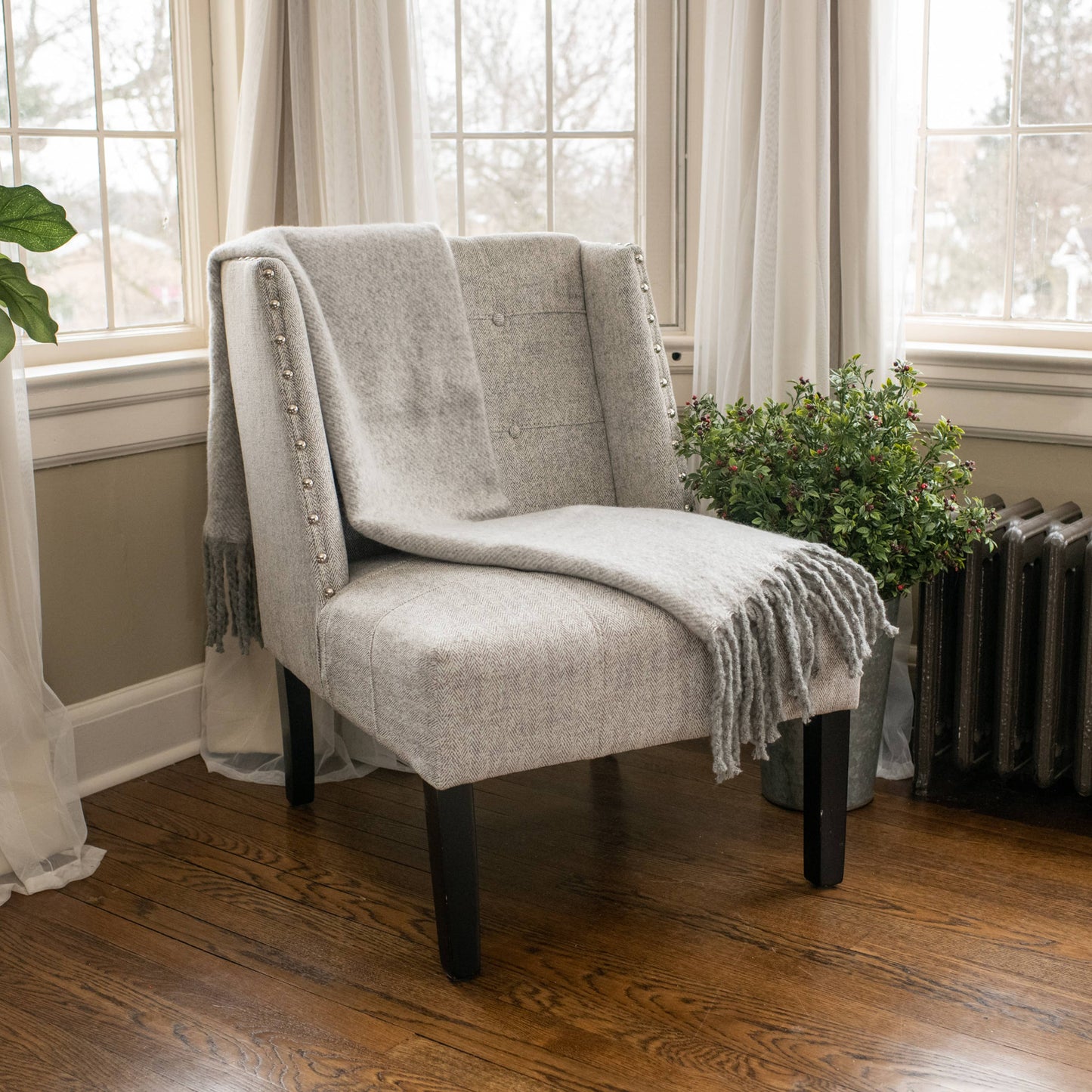 GREY TASSEL THROW