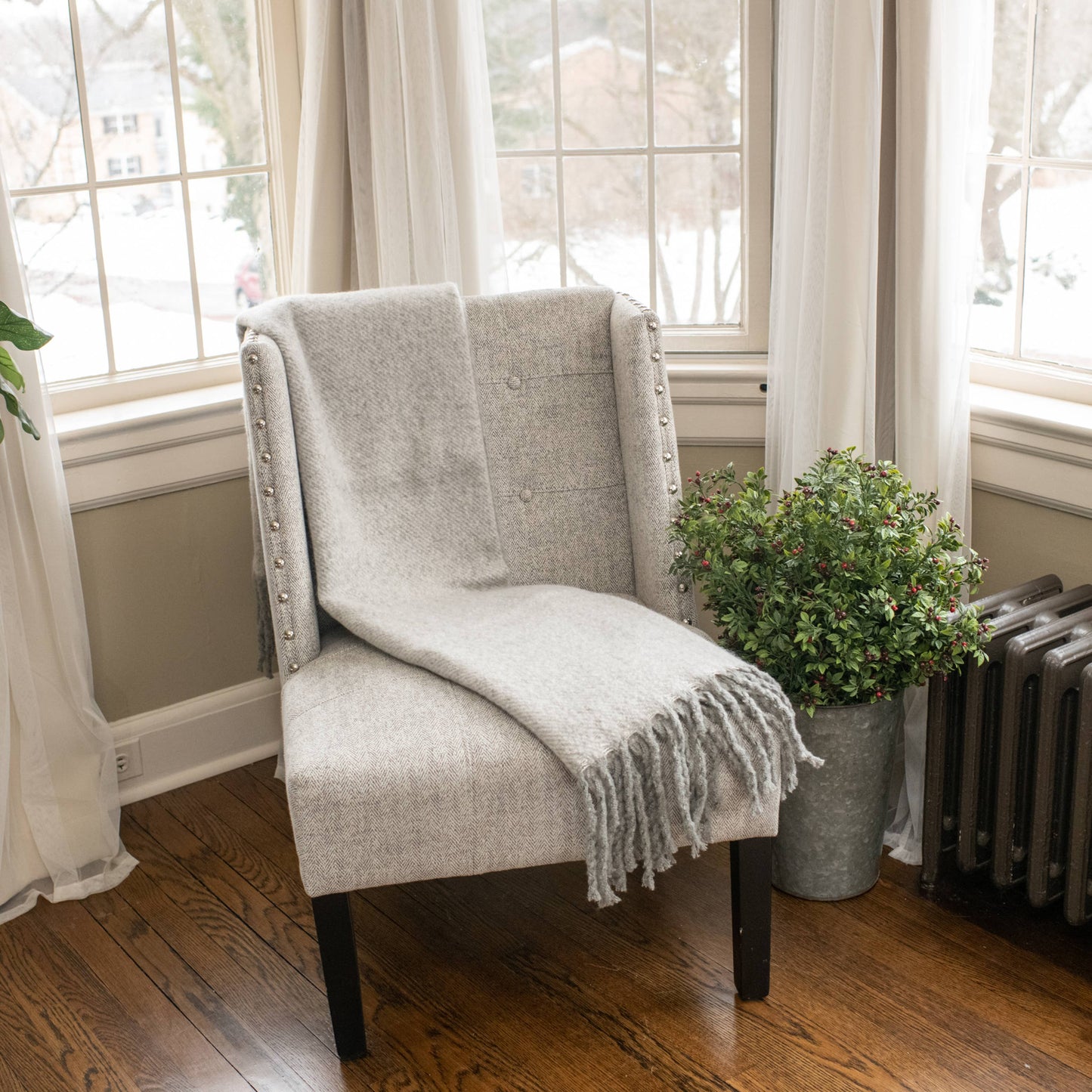 GREY TASSEL THROW