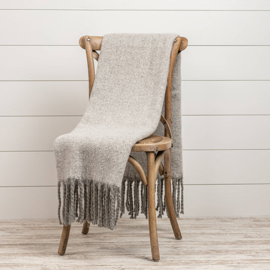 GREY TASSEL THROW